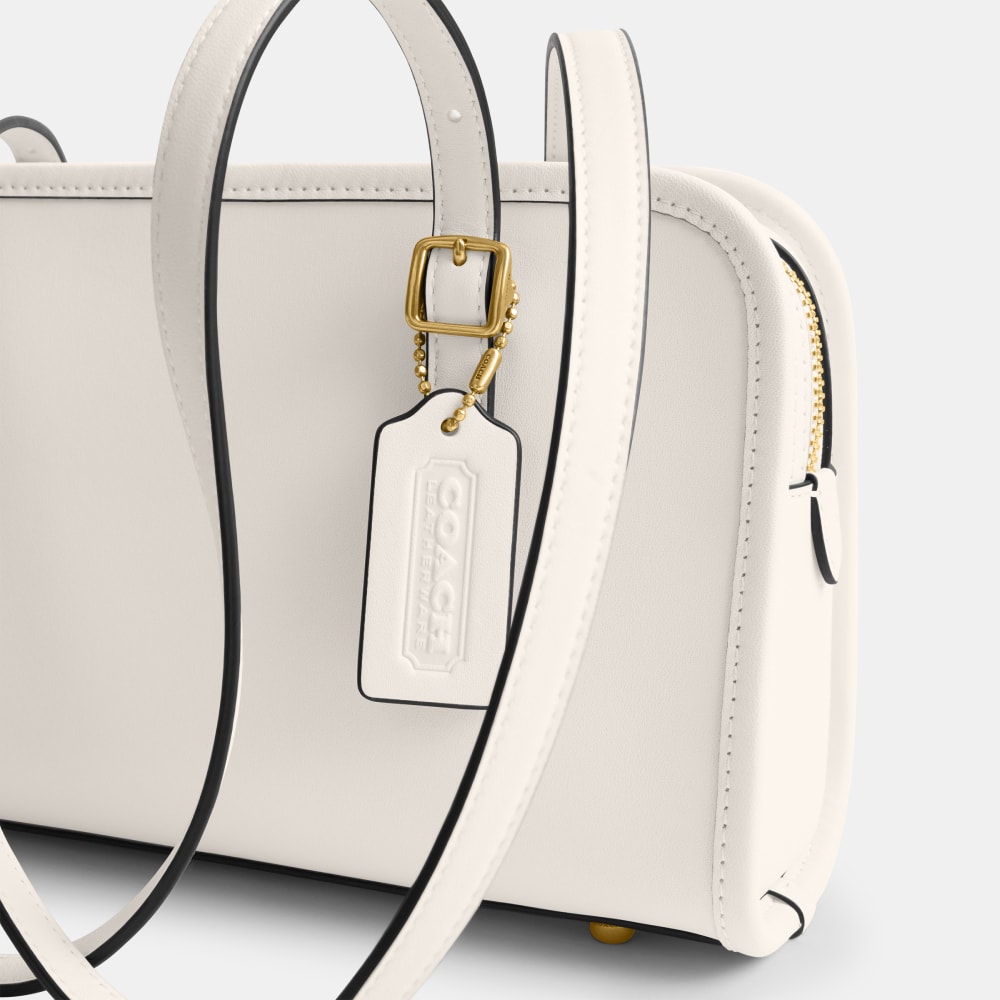 Compre Bolsa swing zip coach com Qualidade | Coach Brasil