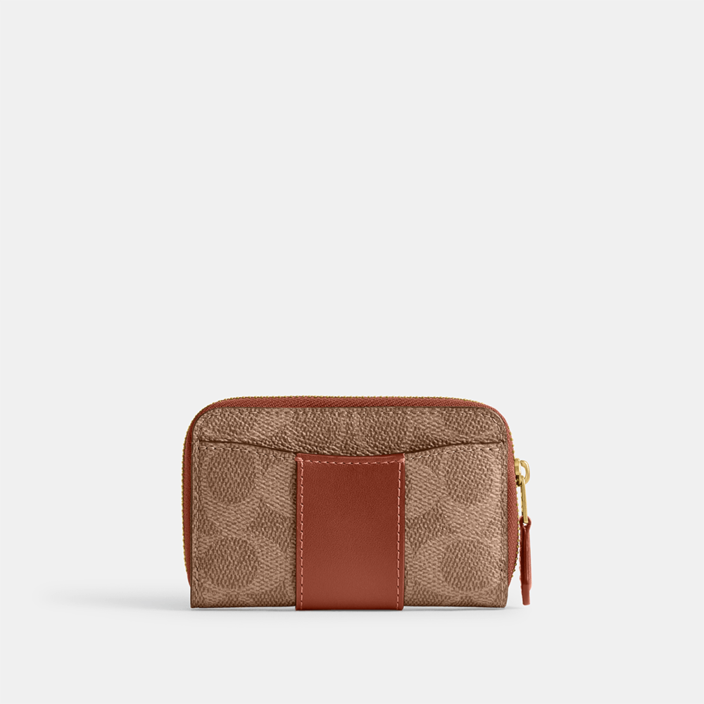 Compre Porta-cartões essential small zip around signature coach