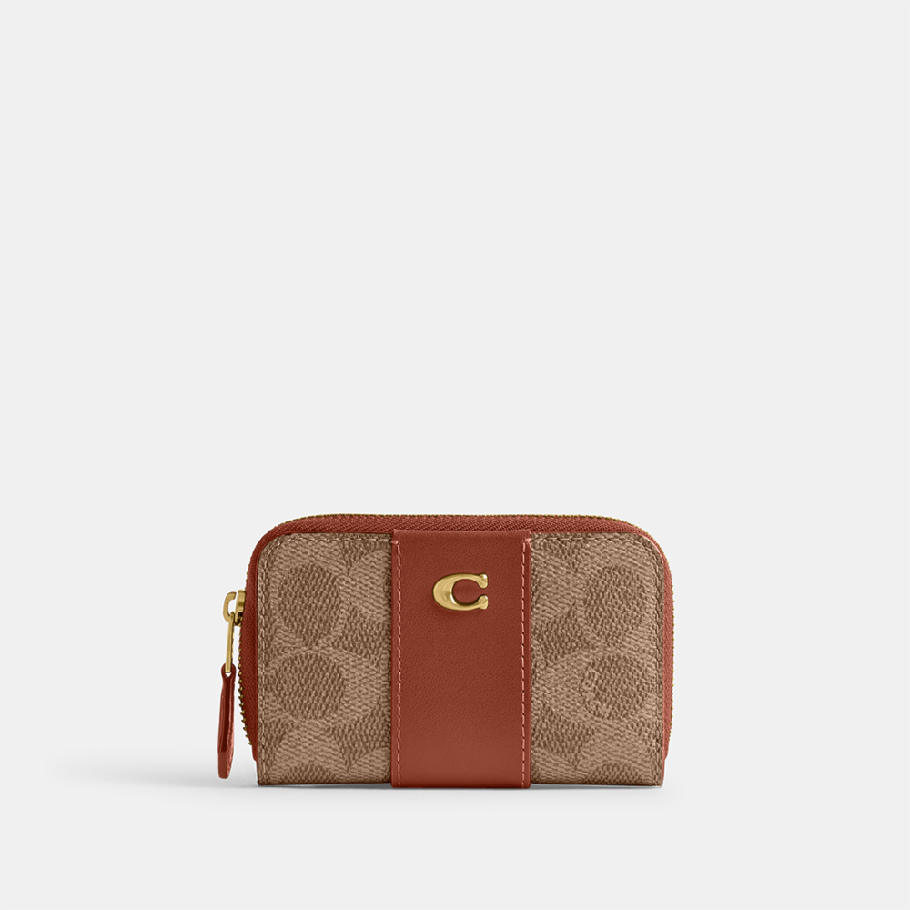 Compre Porta-cartões essential small zip around signature coach
